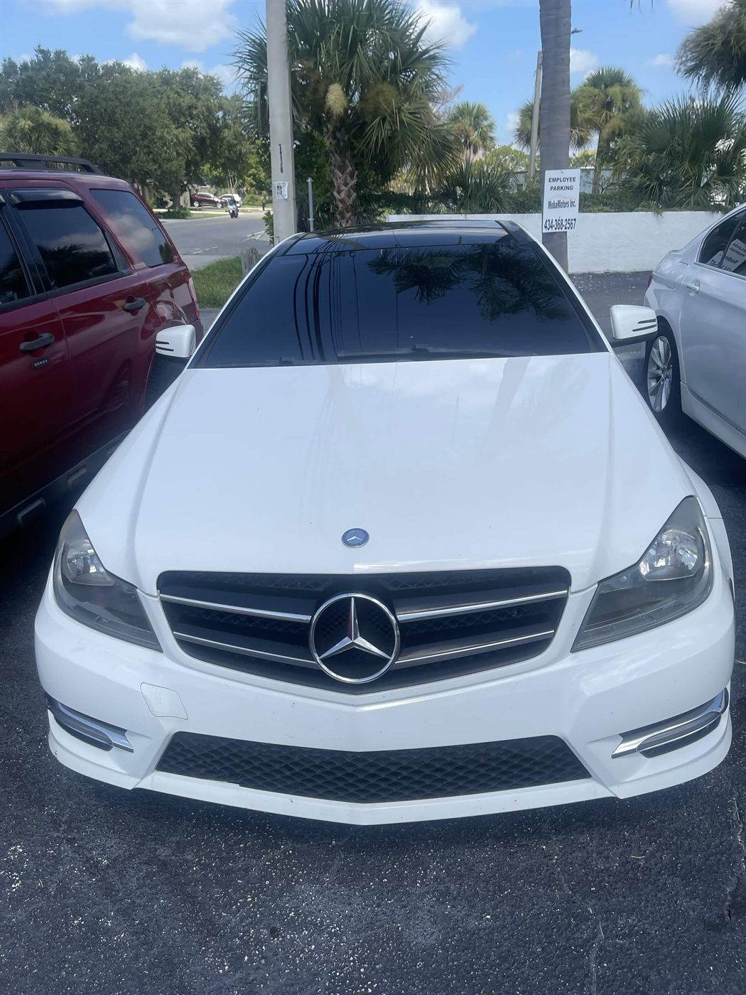 2014 Mercedes-Benz C250 Coupe in white — front view